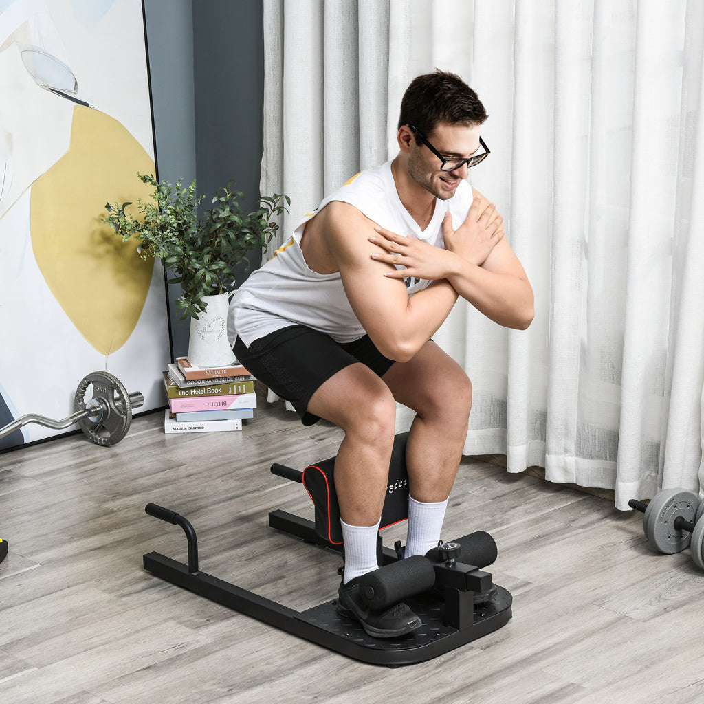 Person using the 3-in-1 padded home gym machine for a supported squat